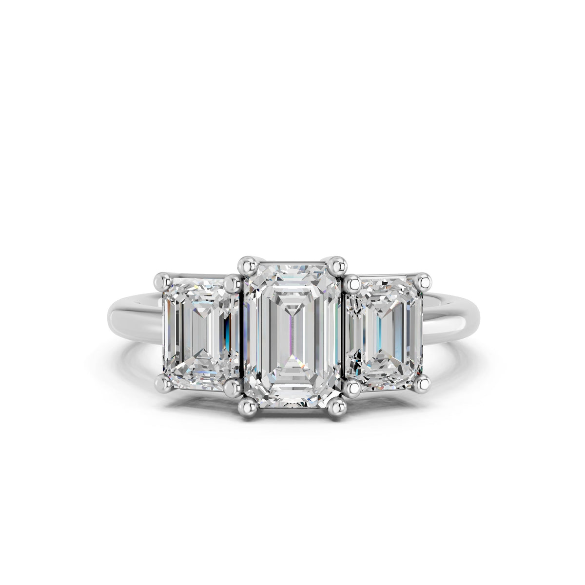 The Emerald Three-Stone Ring: Balance, Not Just Brilliance
