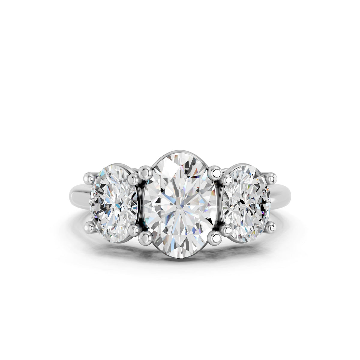 Oval Three-Stone Rings: Building a Bridal Jewelry Look