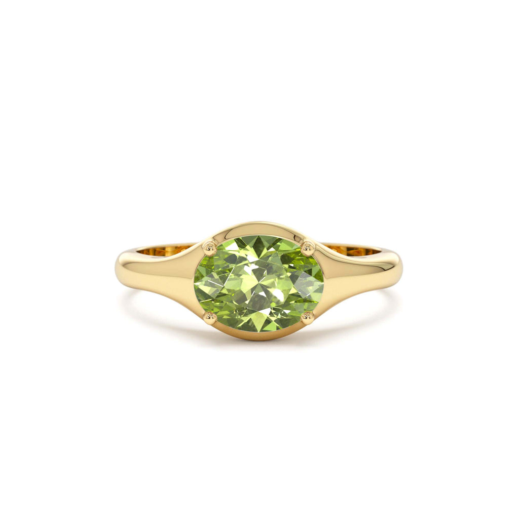 Oval Shape Prong Setting Peridot Ring in 14K Gold — view 1