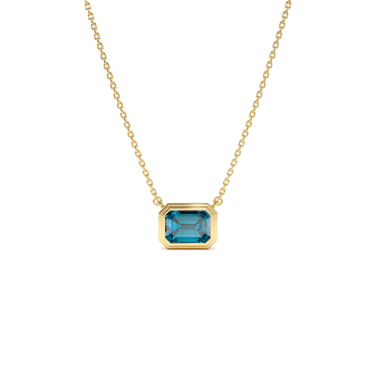 1.25 CTW Emerald Cut Bezel Setting Blue Topaz in 14K Gold — view 1