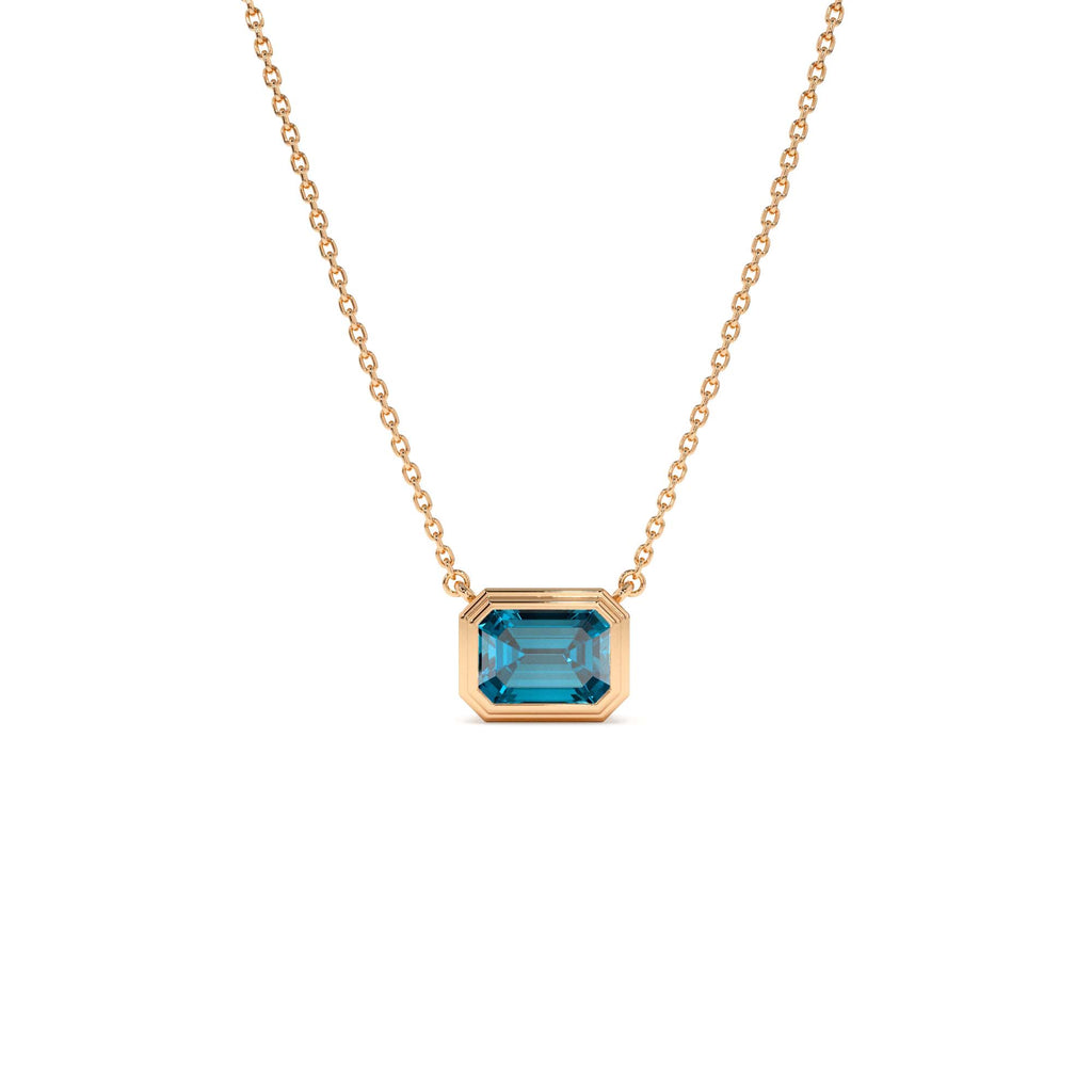 1.25 CTW Emerald Cut Bezel Setting Blue Topaz in 14K Gold — view 3