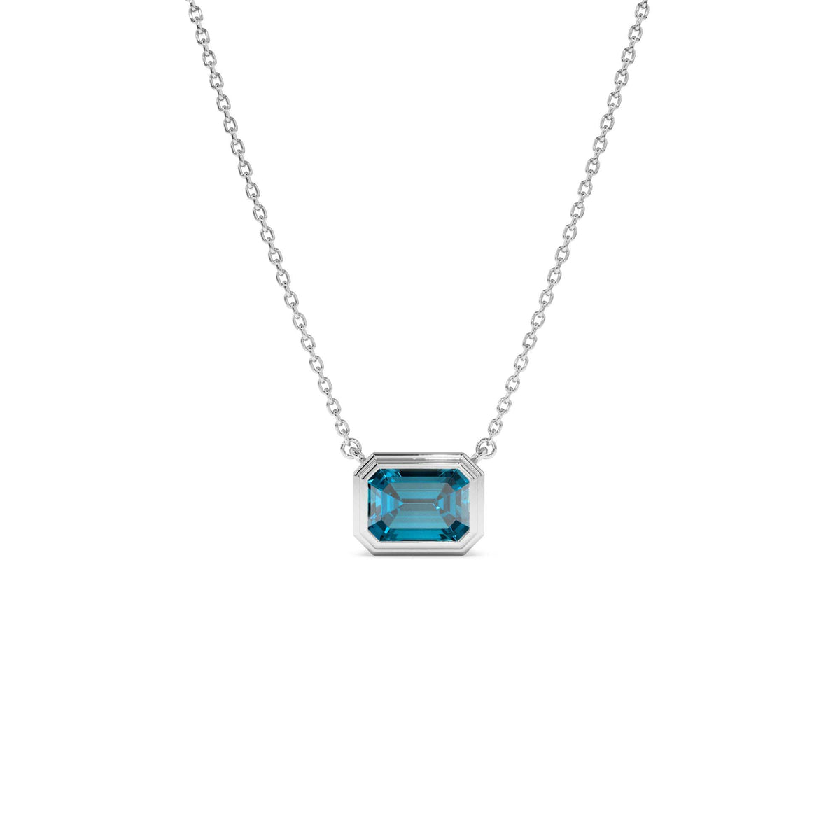 1.25 CTW Emerald Cut Bezel Setting Blue Topaz in 14K Gold — view 2
