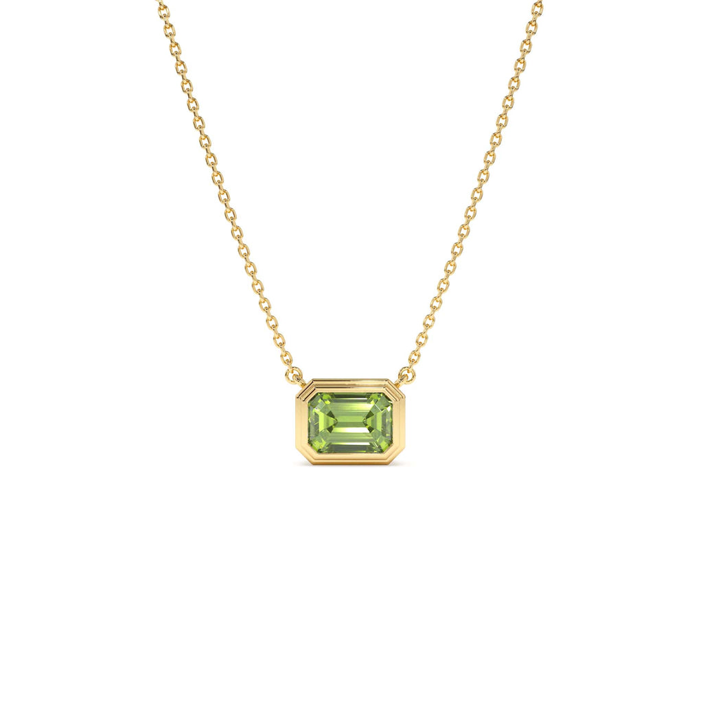 1.15 CTW Emerald Cut Bezel Setting Peridot in 14K Gold — view 1