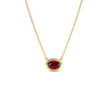 Oval Shape Bezel Set Garnet Necklace in 14K Gold — view 1