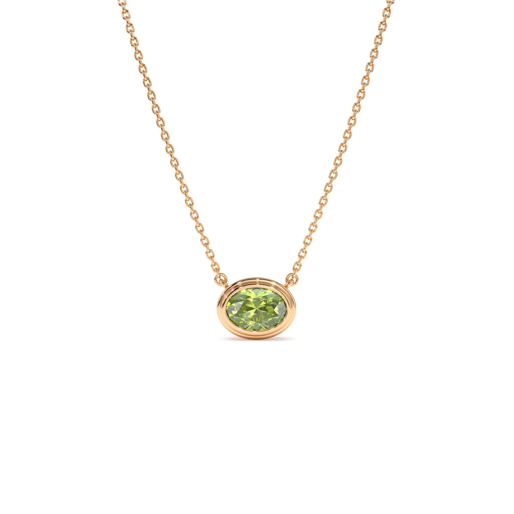 Oval Shape Bezel Set Peridot Necklace in 14K Gold — view 3