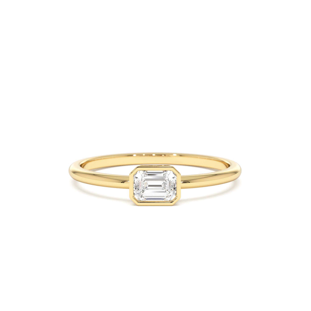 Bezel Set Emerald Cut Diamond Solitaire Ring in 14K Gold — view 1