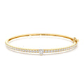 Heart Shaped and Round Diamond Bangle in 14K Gold — view 1