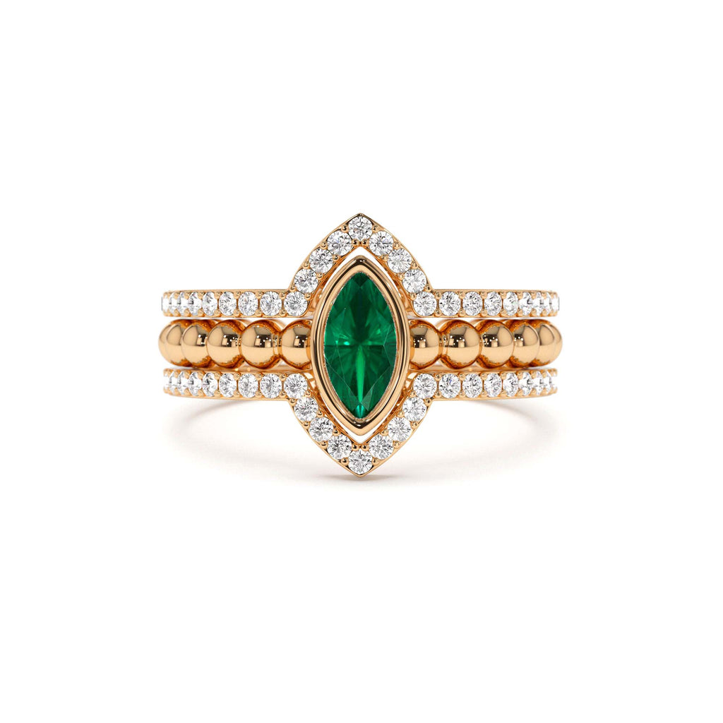 Marquise Shaped Emerald Ring with Nesting Diamond Bands in 14K Gold — view 5