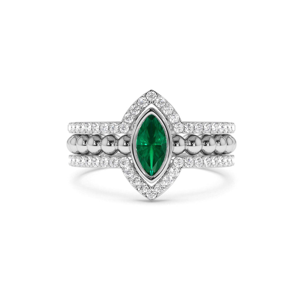 Marquise Shaped Emerald Ring with Nesting Diamond Bands in 14K Gold — view 4