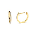 Mini Diamond Huggies Earrings in 14K Gold — view 1