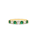 Alternating Emerald and Diamond Wedding Band in 14K Gold — view 1