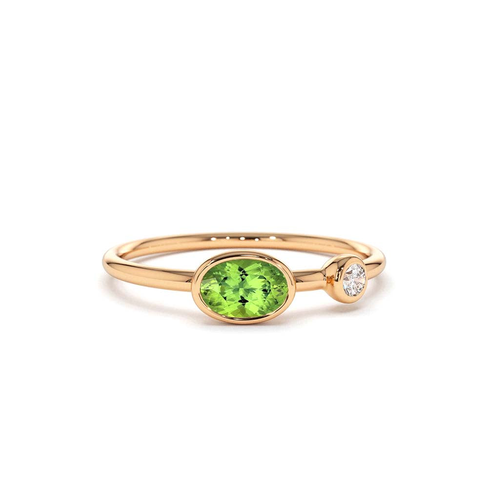 Oval Peridot and Diamond Ring in 14K Gold — view 4