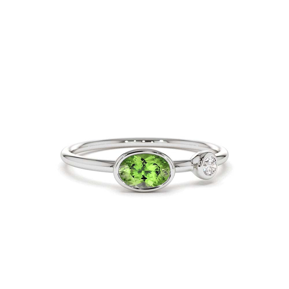 Oval Peridot and Diamond Ring in 14K Gold — view 2