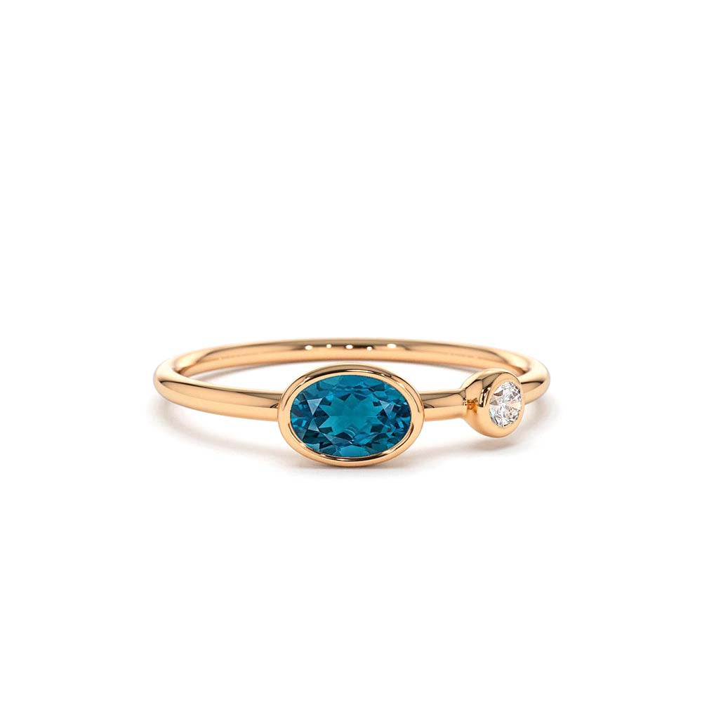 Oval London Blue Topaz and Diamond Ring in 14K Gold — view 4