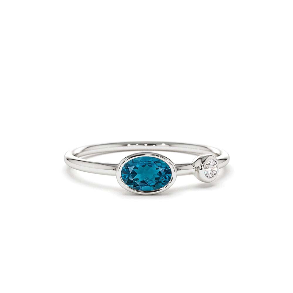 Oval London Blue Topaz and Diamond Ring in 14K Gold — view 3