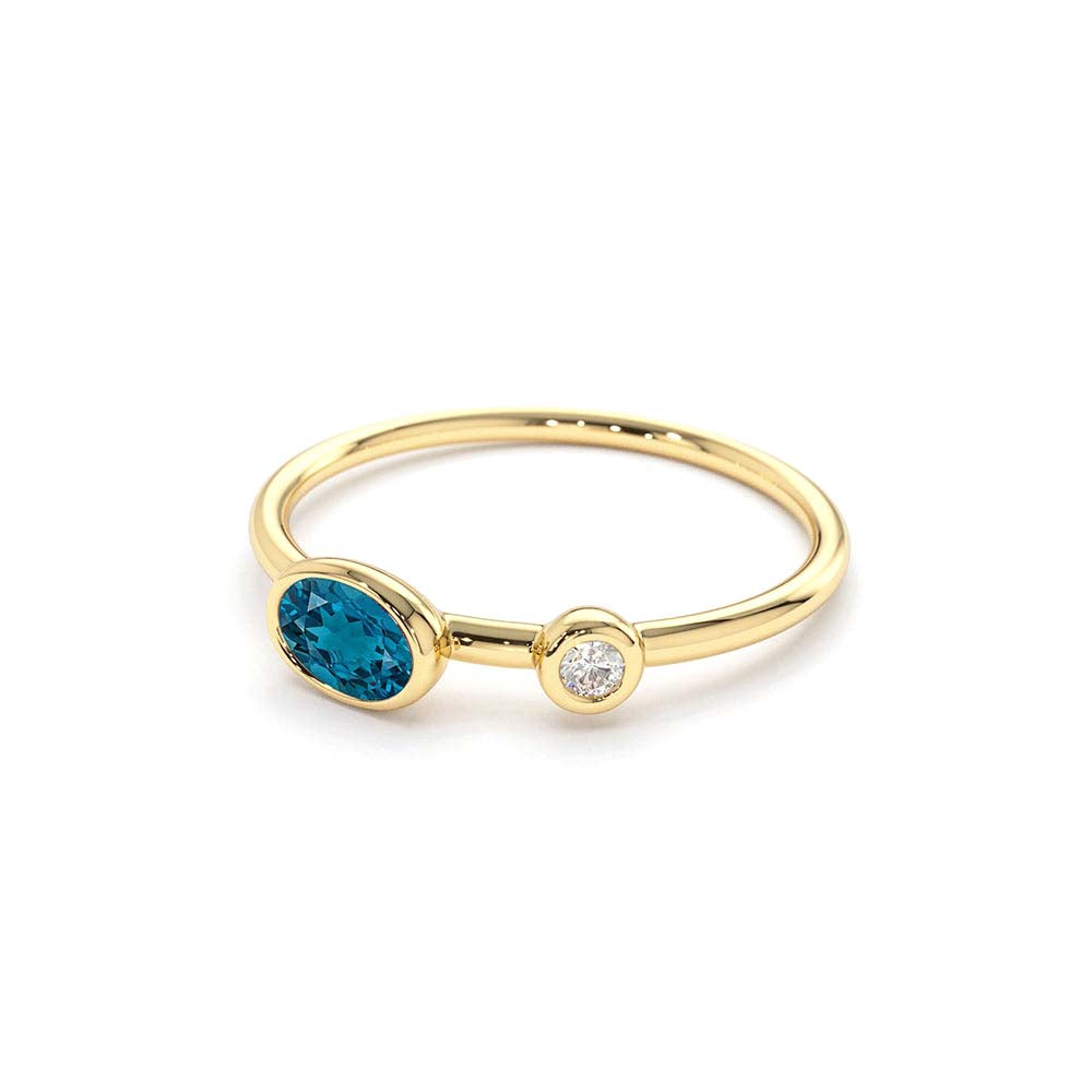 Oval London Blue Topaz and Diamond Ring in 14K Gold — view 2
