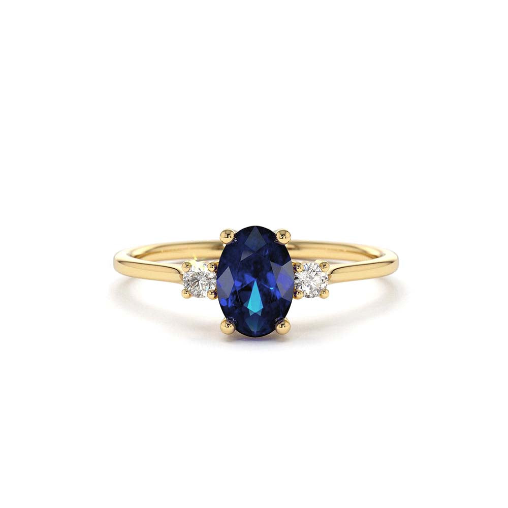 Oval Shape Sapphire and Diamond 3 Stone Ring in 14K Gold — view 1